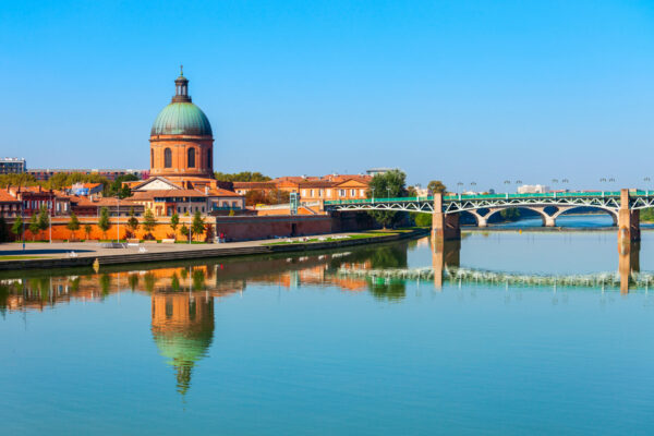 Chapel of hospital Saint Joseph de la Grave and Garonne river embankment in Toulouse city in France